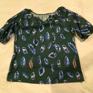 Loose blouse with feathers